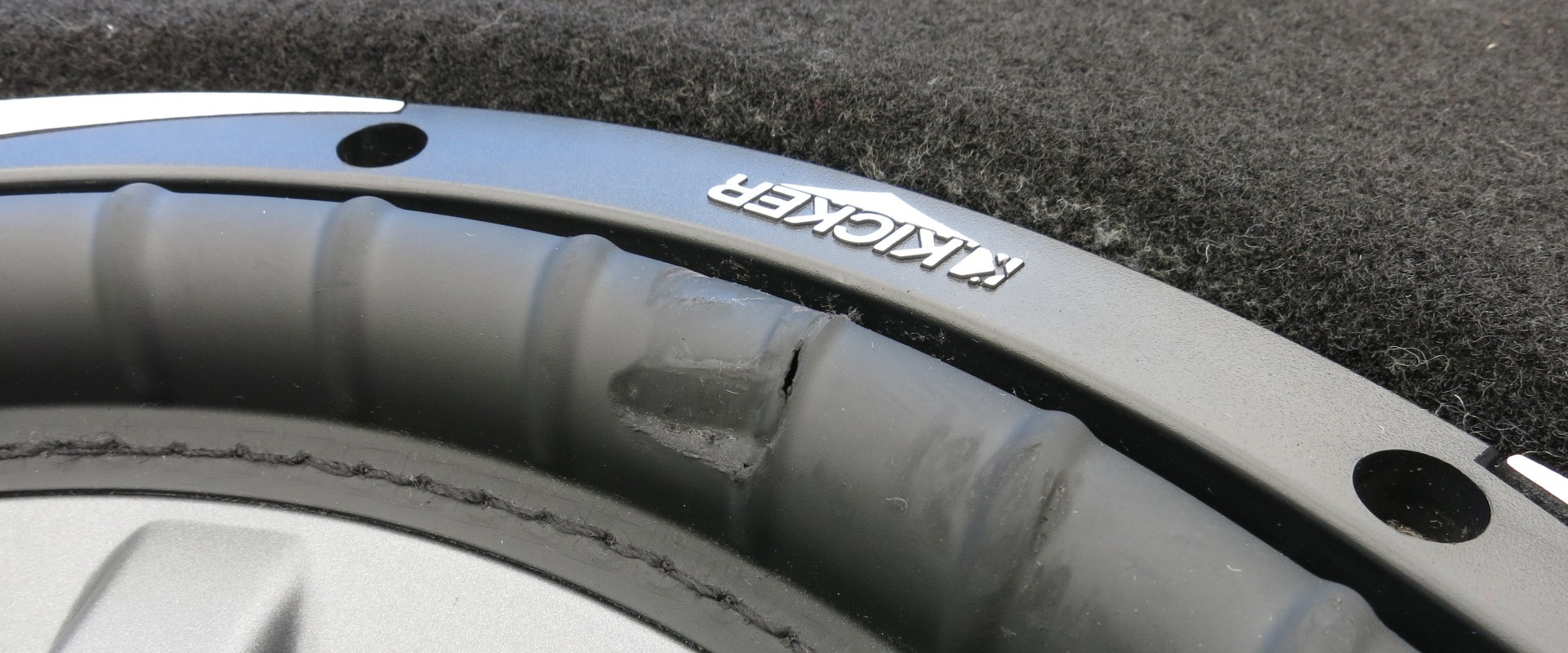 How to Repair a Hole in a Car Subwoofer